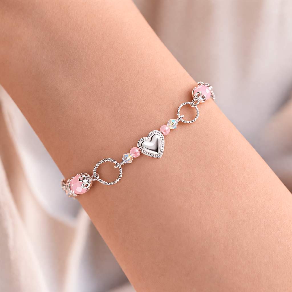 Pulsera de plata 925 para mujer con diseño de corazón y piedras rosadas, estilo elegante en muñeca