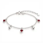 Pulsera Corazones Rojos en plata 925 con tres dijes de cristal rojo y dos corazones plateados de Glow Secret.