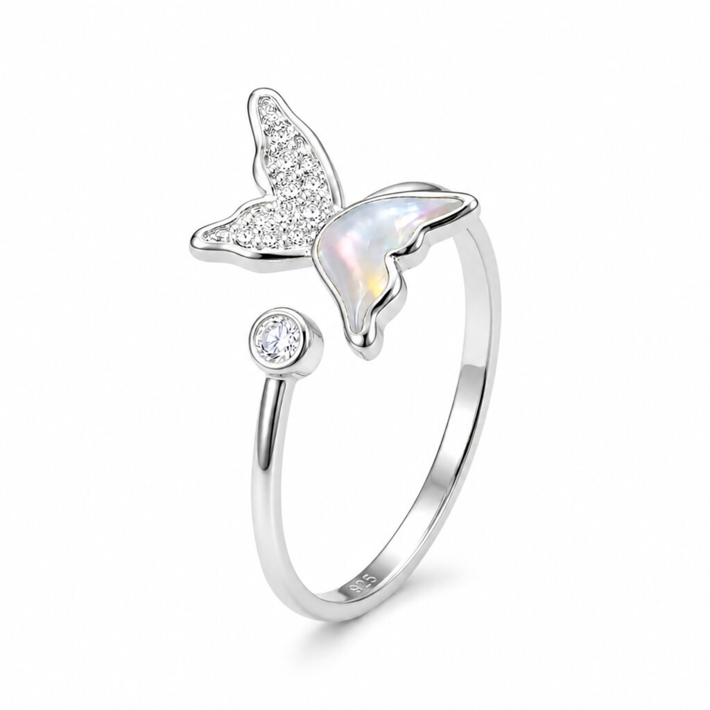 Anillo Mariposa Tornasol Ajustable en plata 925 con efecto iridiscente y circón en fondo blanco